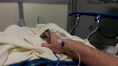 POV view of a mans arm with an needle in the vein. Intravenous injections Stock-Footage 313256652