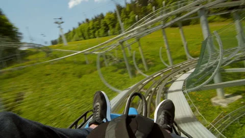 POV view in moving action man coming up a mountain roller outdoor adventure Video stock 254009713