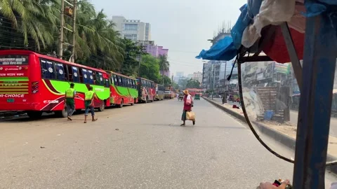 POV View From Moving Auto Rickshaw Navigating Busy Dhaka Road With Pedestrians Stock Footage 345367313