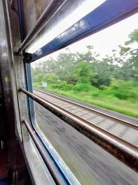 POV view from moving train window in Bangladesh with motion blur Stock Photos