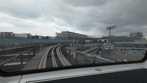 POV view out of skyline train for transferring between terminals in Frankfurt Ai Stock Footage 307761578