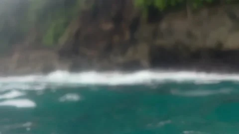 POV view of swimming in a rip current near rocky shore. Dangerous situation in Stock Footage 238474698