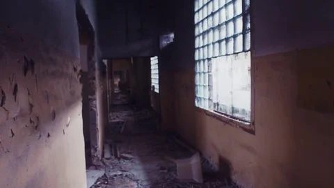 POV view walking through corridor in abandoned building destroyed by earthquake Video stock 80311160