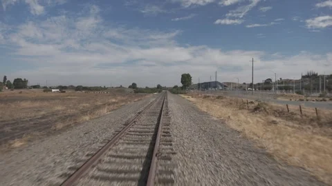 POV view while flying down the railroad tracks in the afternoon Vidéo 313637693