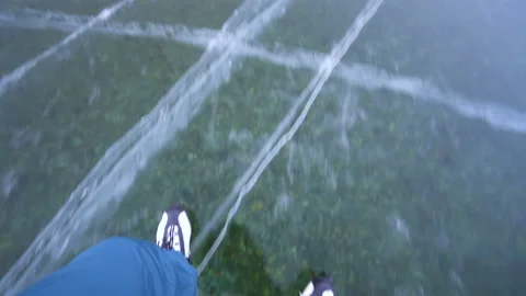 Pov view winter fun outdoor. Person is ice skating on frozen lake Stock Footage 101641120