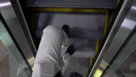 POV walk and look down at escalator which is malfunction Stock Footage 169998646