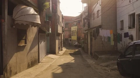 Pov walk in destroyed old Favela street in sao Paulo during Sunset time, Stock Footage 250130197