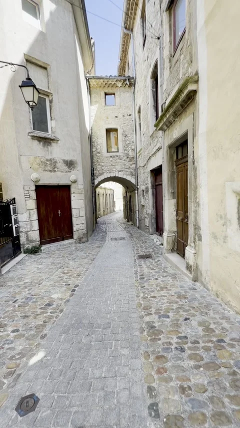 POV Walk Through Medieval Stone Archway in Viviers France Stock Footage 346486951
