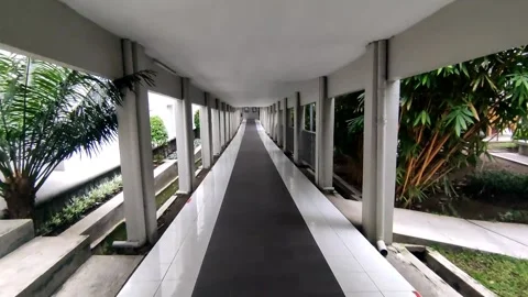 POV Walking alone in a long corridor Stock Footage 308463574