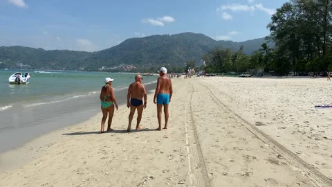 POV walking along the sandy beach, Patong. Editorial vacation and holiday Stock Footage 266987736
