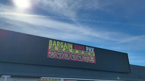 POV Walking into Bargain Bin Store Stock Footage 327670241