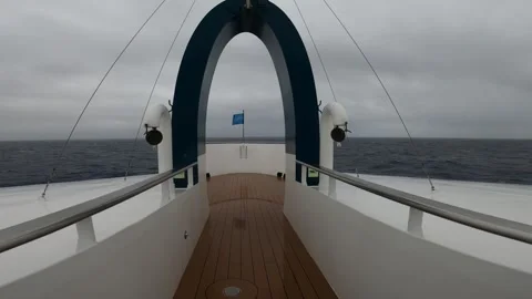 POV walking to bow deck of expedition cruise ship crossing Drake Passage Видео 335278525