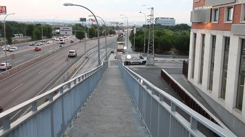 POV walking down bridge walkway in Spain early morning Stock Footage 98410030