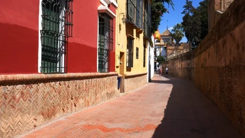 POV walking down old picturesque passageway in the medieval Jewish Quarter of Stock Footage 116273692