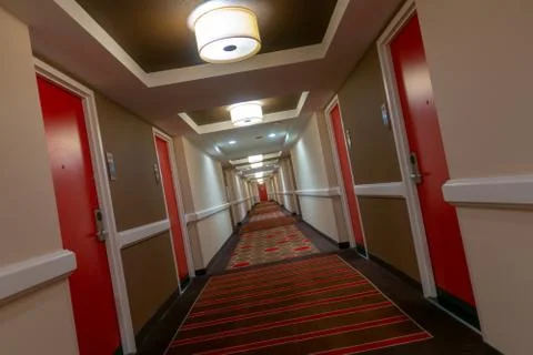 POV of walking in long corridor Stock Photos