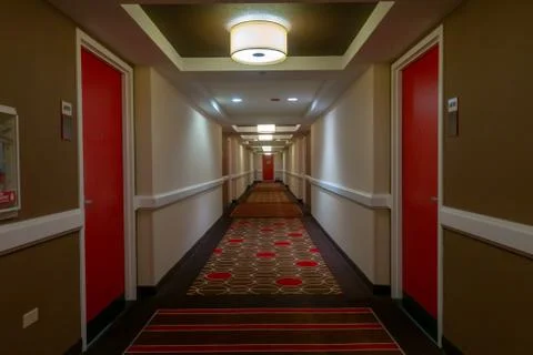 POV of walking in long corridor Stock Photos