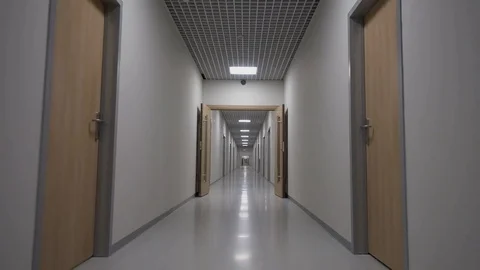 POV walking in a long white empty corridor Vídeos de archivo 81760388