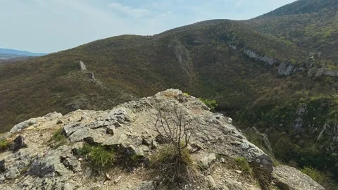 POV Walking to Mountain Cliff Edge - 4K Cinematic Freedom &amp; Wellness Vista Video stock 332729169