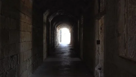 POV walking in narrow passageway or tunnel in old Austro-Hungarian fortress Stock Footage 186674972
