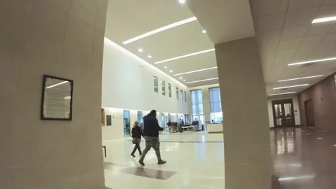 POV walking Richmond County courthouse digital court docket and people Stock Footage 248634548