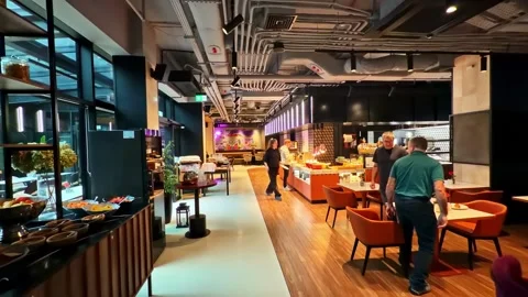 POV Walking Shot Through Modern Hotel Restaurant Buffet Area in Krakow Lesser Stock Footage 337043823