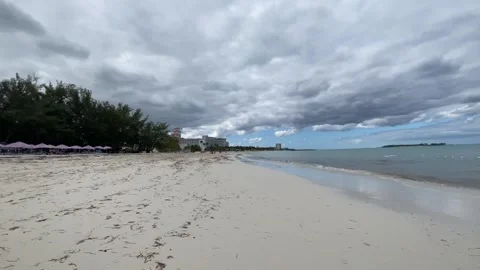 POV walking through Baja Mar Beach in Bahamas Stock Footage 329900448
