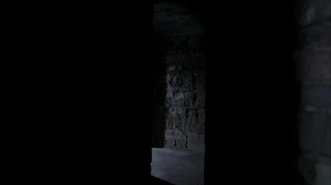 POV walking through dark Medieval Castle corridor Stock Footage 128643667