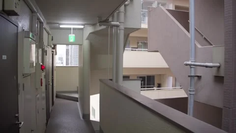 Pov walking through an empty apartment building corridor Video stock 340253413