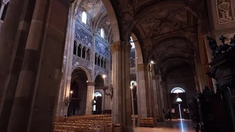 POV walking through Parma Cathedral looking up at decorated ceiling and arches Stock-Footage 296629887