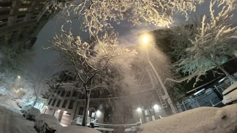 POV Walking Through Snow Covered Manhattan Street Night Snowfall Video stock 330214811