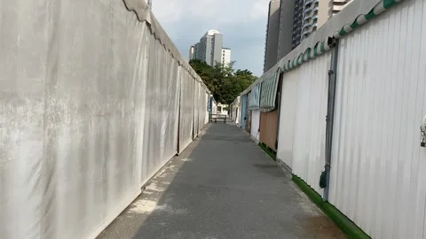 POV walking towards empty small alley at retail at JODD FAIRS DanNeramit. Stock Footage 262577807
