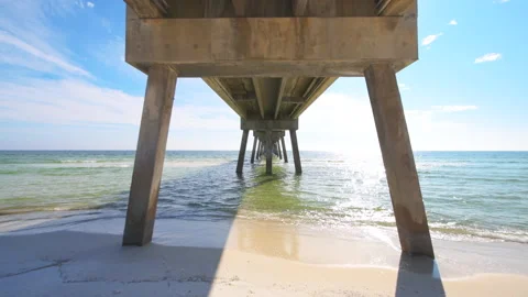 Pov walking under Florida Fort Walton beach Okaloosa island fishing pier Stock-Footage 154257853