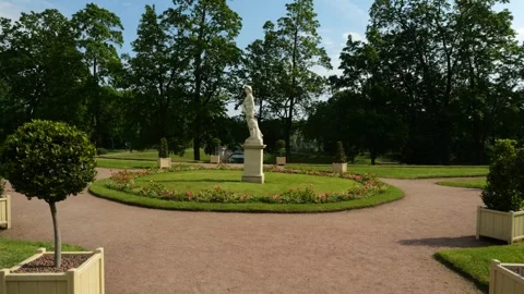 POV walks to statue of Young Mars in Lower Dutch Garden of Gatchina Palace Park Video stock 317781910