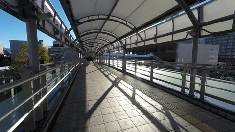 POV of Walkway to Train Station Stock Footage 80444299