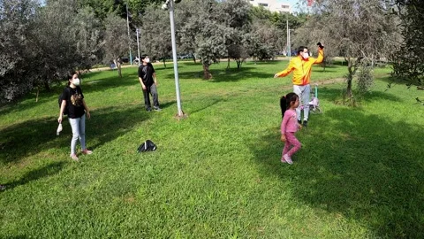 POV warming up to go for a run in El Pentagonito park in San Borja on a sunny Stock Footage 156514815