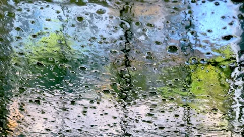POV Watching a car being cleaned from the inside. Giant rollers come down to bla Stock Footage 104581680