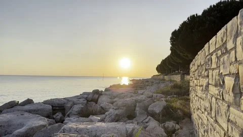 POV Watching the sunset from the beach Stock Footage 191615654