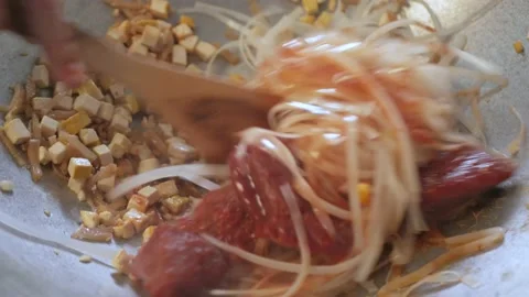POV while cooking fry Pad Thai in kitchen. Famous street food of thailand Stock Footage 172255683