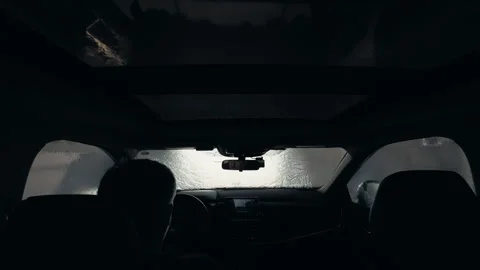 POV wide footage of Driver inside vehicle entering automatic car wash with Stock Footage 332183569