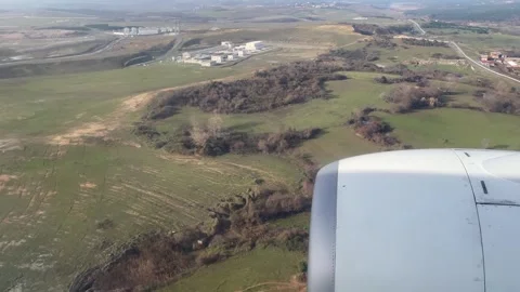 POV Of window plane flying over land in Turkey Stock Footage 277289428