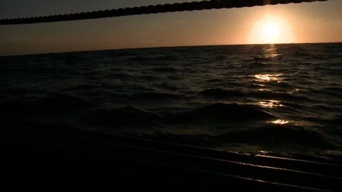 POV from window to sea waves during sunset, Canada Stock Footage 132398509