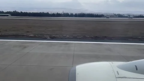 POV window shot of plane taking off in Cappadocia Kayseri airport in Turkey Stock Footage 277289422