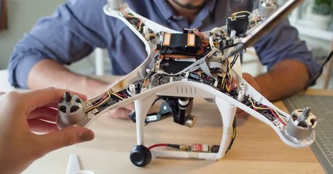 POV Woman's hands testing electronics in a drone Stock Footage 80316958