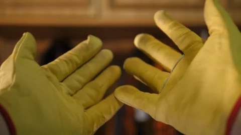 POV Worker put on Yellow Gloves on Hands. Poin of view Diy carpenter working. 库存影片 129460701
