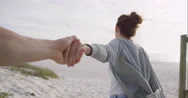 Pov Of Young Couple Holding Hands Woman Leading Boyfriends Walking Towards Stock Footage