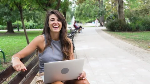 POV young freelancer or student woman talking to the camera while sitting i.. Stock Footage 250816760