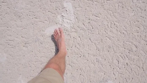 POV young man walking on the sand Stock-Footage 76554318