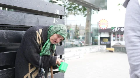 Poverty and Begging on the Streets of Eastern Europe, Moldova. Old woman Stock Footage 312179469