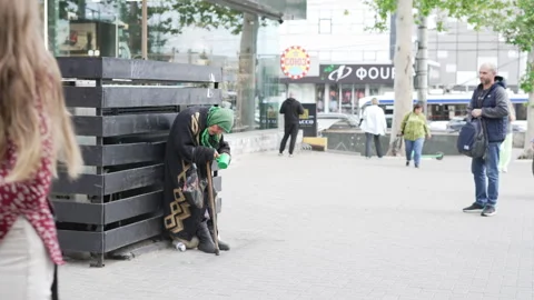 Poverty and Begging on the Streets of Eastern Europe, Moldova. Old woman. Help Video stock 312179575