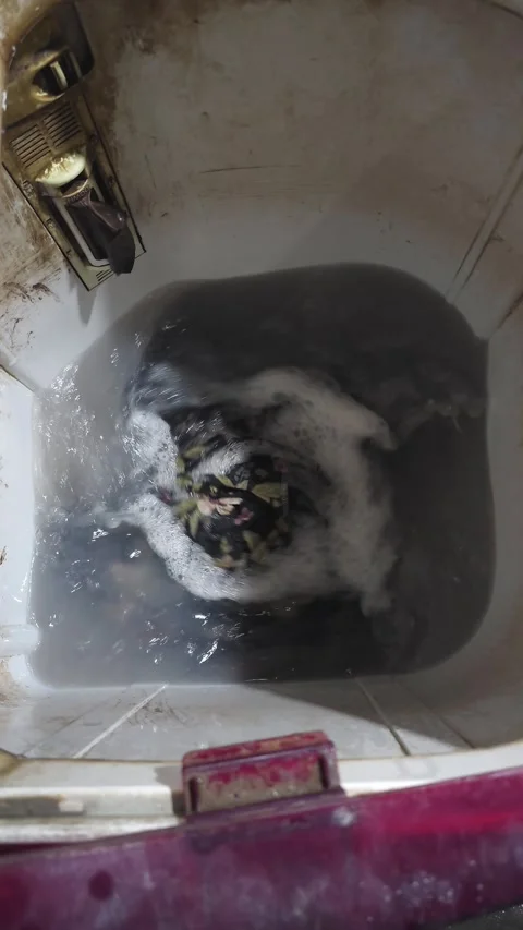 Poverty Issue Grimy Old Washing Machine Churning Laundry Stock Footage 332042091